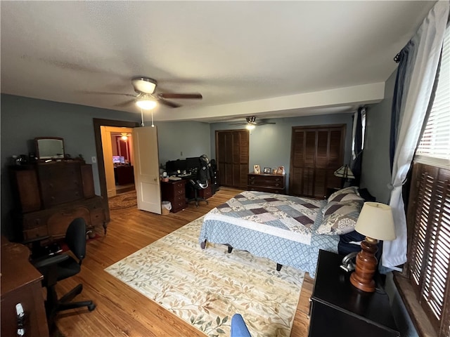 bedroom featuring ceiling fan and light wood-type flooring