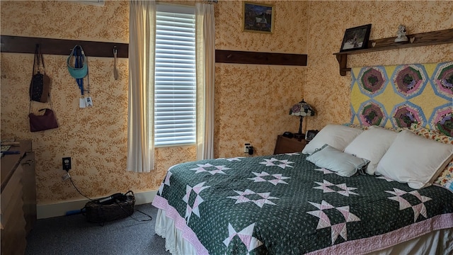 carpeted bedroom with multiple windows