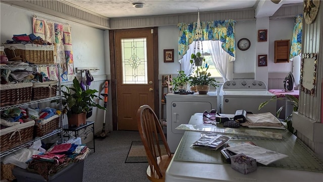 dining area featuring carpet floors and separate washer and dryer