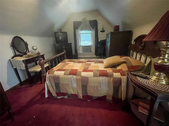 carpeted bedroom with vaulted ceiling and cooling unit