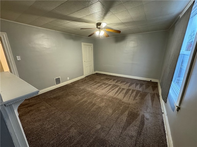 unfurnished room featuring carpet and ceiling fan