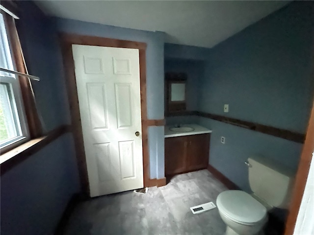 bathroom with vanity and toilet