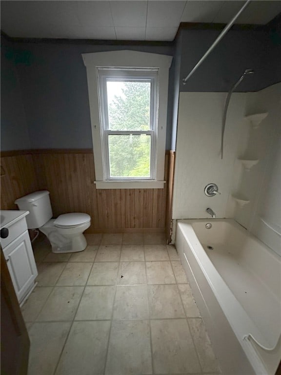 full bathroom featuring tile patterned flooring,  shower combination, toilet, and vanity