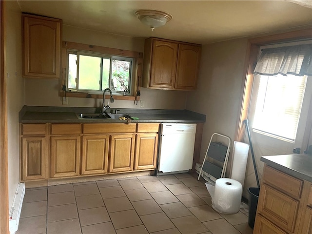 kitchen with light tile patterned floors, a baseboard heating unit, sink, and dishwasher