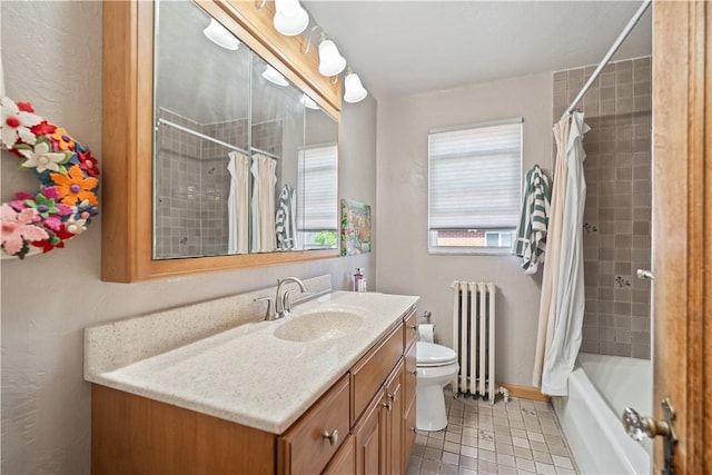 full bathroom featuring vanity, radiator, tile patterned flooring, shower / bath combo with shower curtain, and toilet