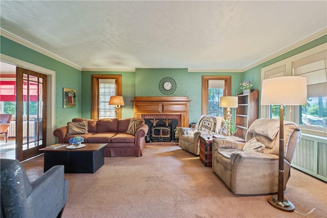 living area featuring a wealth of natural light and carpet floors