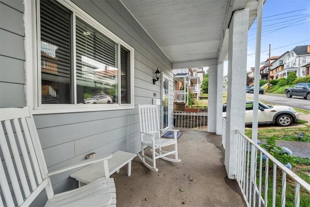 view of patio featuring a porch