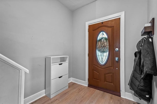 entrance foyer featuring light hardwood / wood-style floors