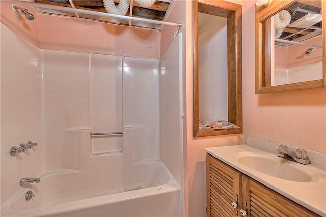 bathroom featuring shower / bath combination and vanity