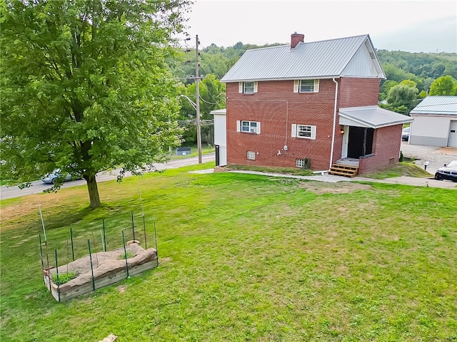 view of property exterior featuring a lawn