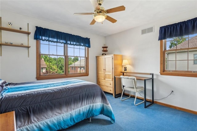 carpeted bedroom with ceiling fan