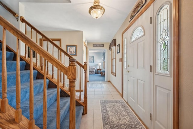 view of tiled foyer entrance