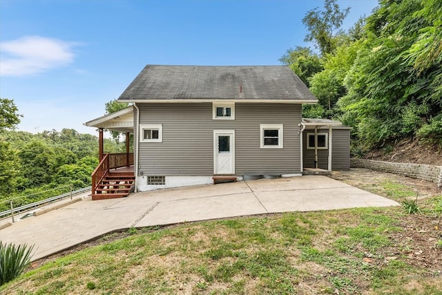 rear view of property with a patio area