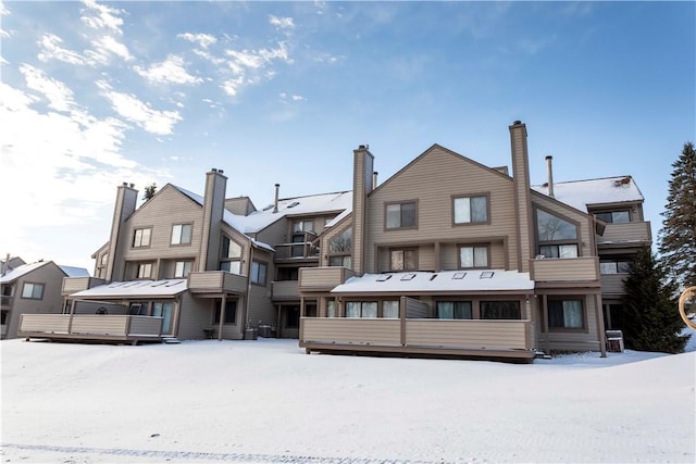 view of snow covered property