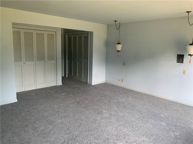 unfurnished bedroom featuring carpet