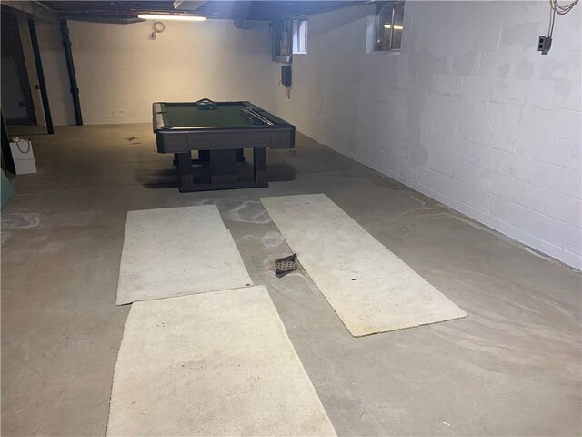 basement featuring electric panel and billiards