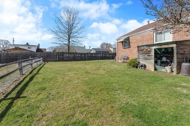 view of yard featuring a fenced backyard