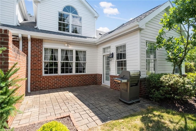 back of property with a patio area