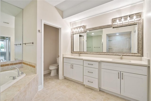 full bathroom with tile patterned floors, vanity, toilet, and shower with separate bathtub