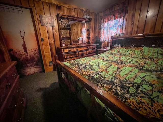 bedroom featuring wood walls