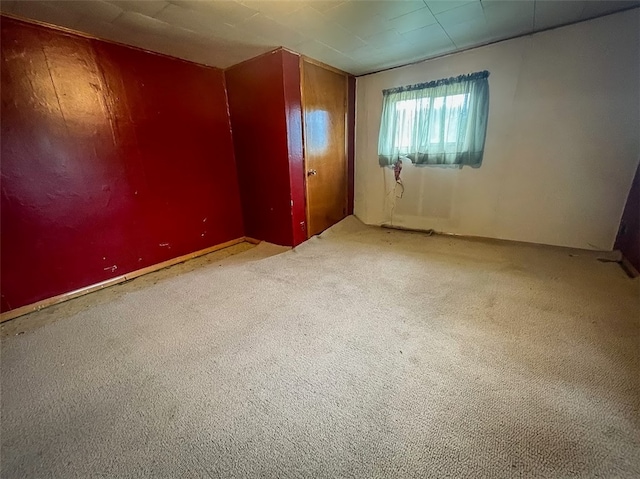 spare room with carpet floors