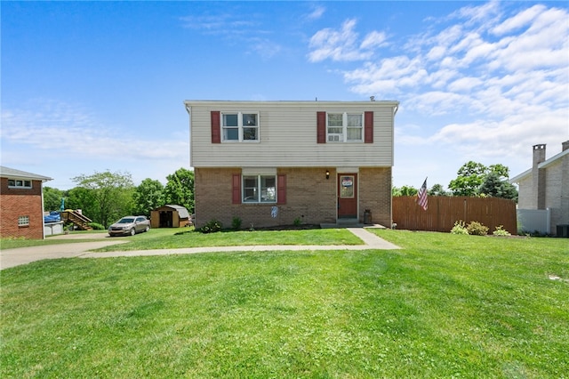 view of front of home with a front yard