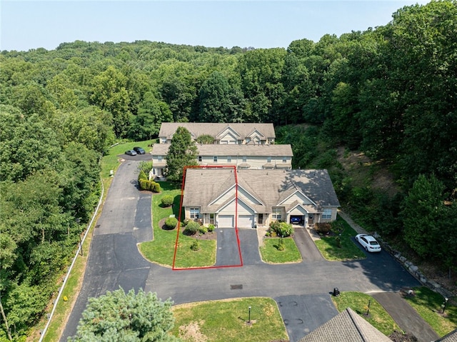 aerial view featuring a view of trees