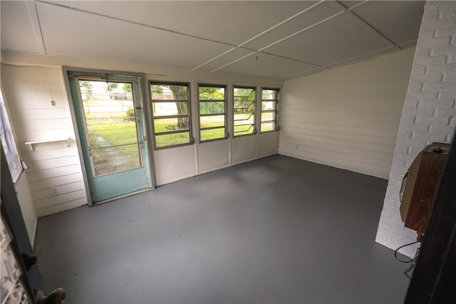 unfurnished sunroom featuring plenty of natural light