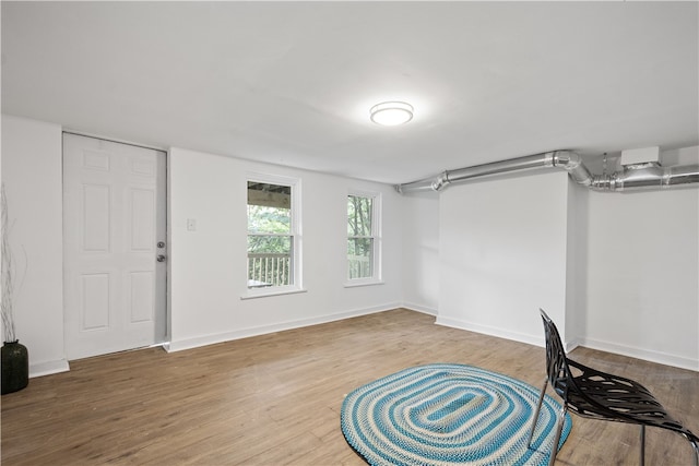 basement with wood-type flooring