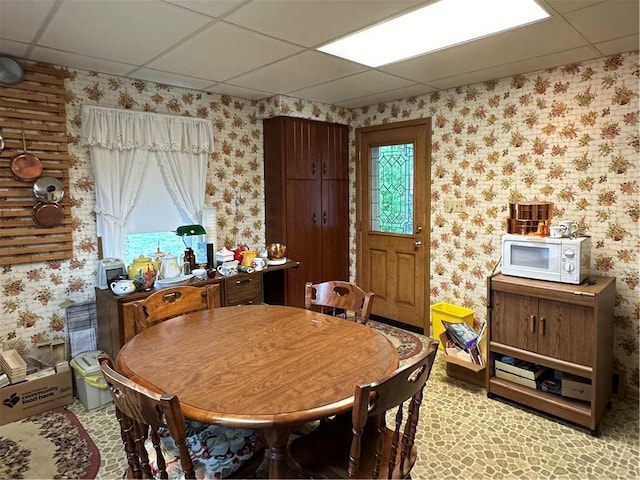 901 Clearfield Rd, Clearfield Twp, PA 16034 - dining area featuring a drop ceiling and wallpapered walls