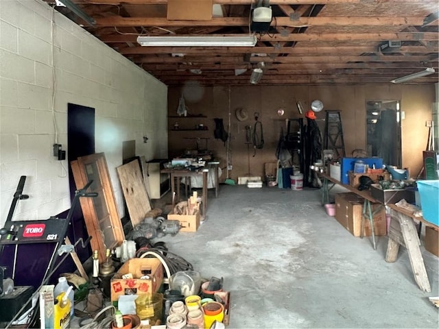 901 Clearfield Rd, Clearfield Twp, PA 16034 - interior space with concrete block wall and a garage door opener