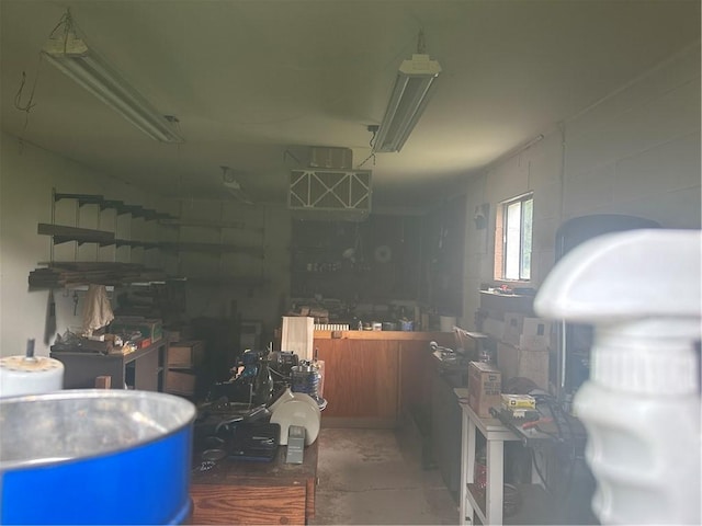 901 Clearfield Rd, Clearfield Twp, PA 16034 - interior space featuring a garage, a workshop area, and unfinished concrete floors