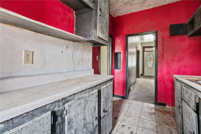 kitchen featuring light tile patterned flooring