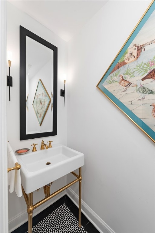 bathroom with sink and tile patterned floors