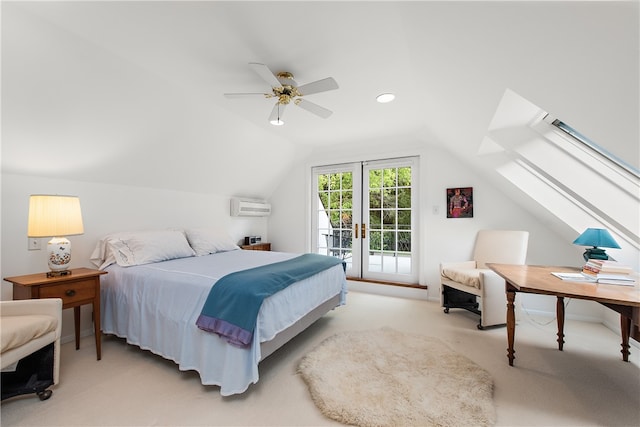 carpeted bedroom with ceiling fan, a wall unit AC, french doors, vaulted ceiling, and access to exterior