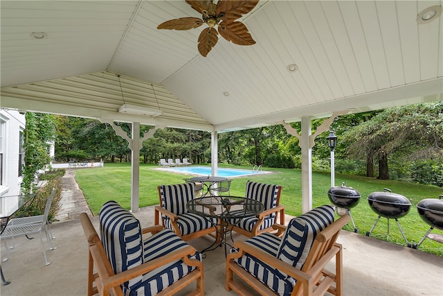 view of patio featuring ceiling fan