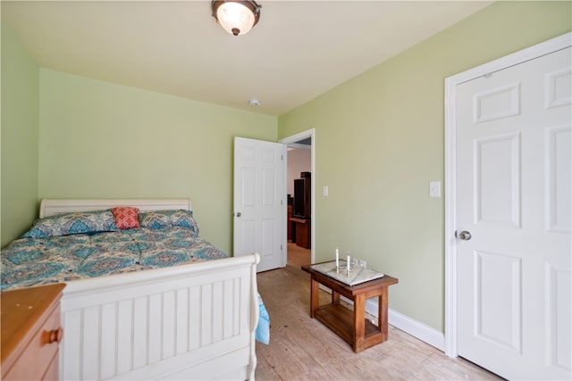 bedroom with light hardwood / wood-style floors