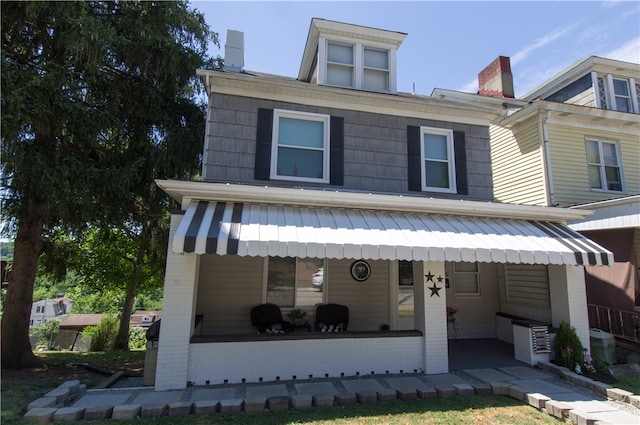 view of front facade with covered porch