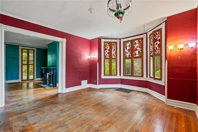 spare room featuring hardwood / wood-style floors