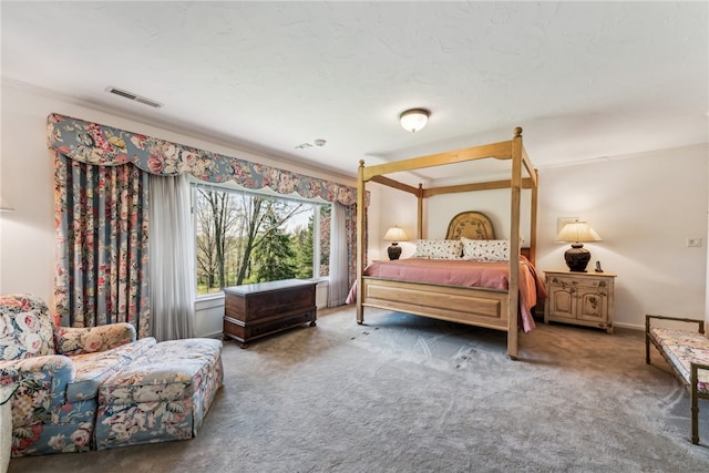 bedroom featuring crown molding and carpet flooring