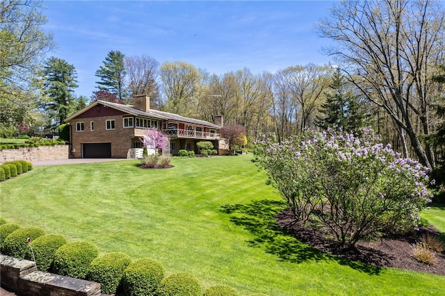 view of yard featuring a garage