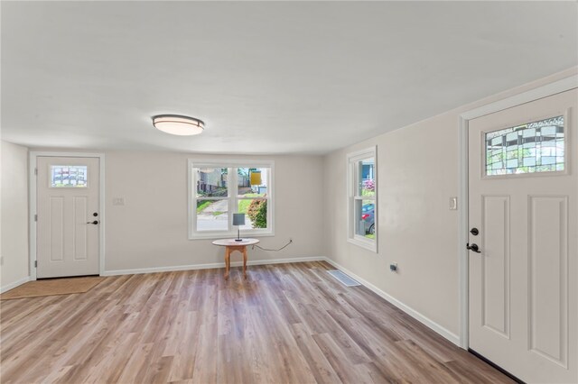 entrance foyer featuring light hardwood / wood-style floors