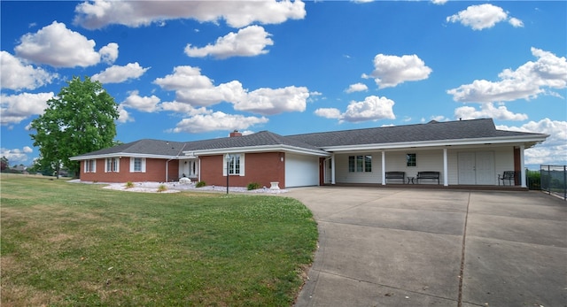 ranch-style home with a front yard and a garage