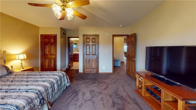 bedroom with ceiling fan and carpet floors