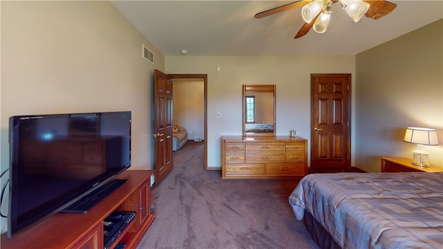 carpeted bedroom with ceiling fan