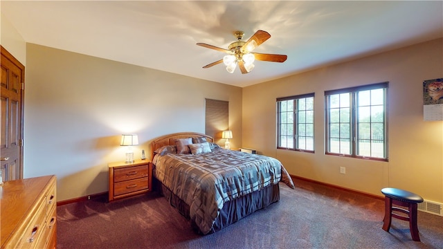 carpeted bedroom featuring ceiling fan