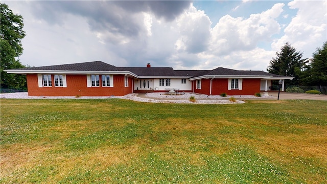 single story home featuring a front yard