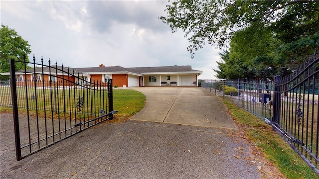 1490 Olde Stable Ln, Moon/Crescent Twp, PA 15108 - ranch-style home featuring a fenced front yard, an attached garage, and driveway