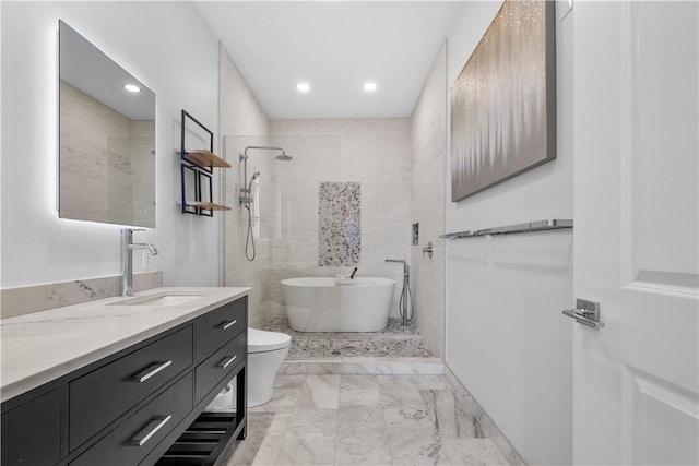 full bathroom with walk in shower, a freestanding bath, vanity, marble finish flooring, and recessed lighting