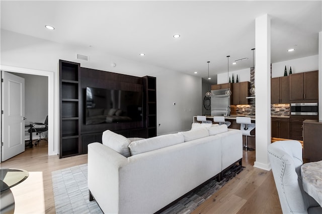 living room featuring light hardwood / wood-style floors